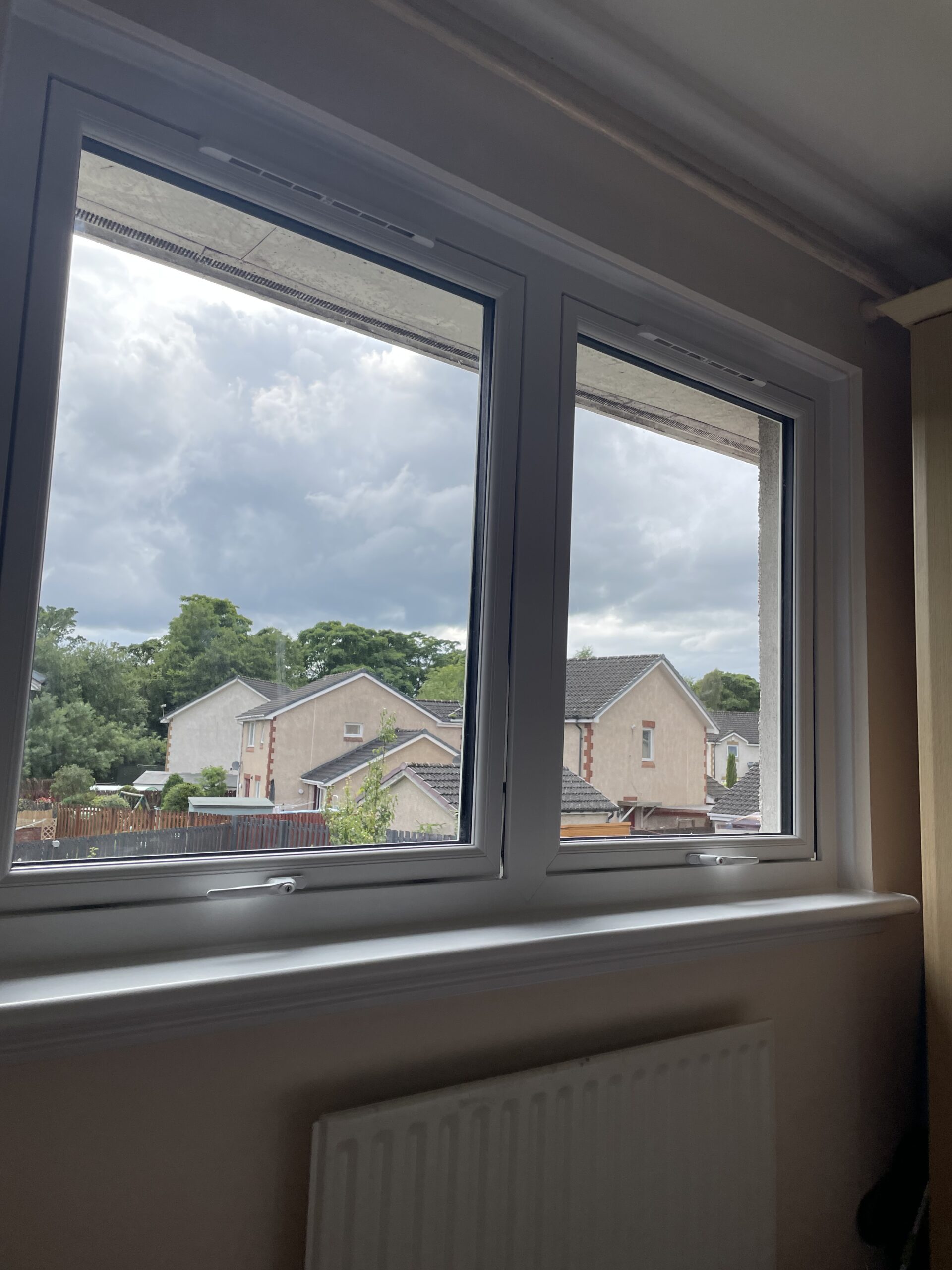 Reversible uPVC window in Milton of Campsie